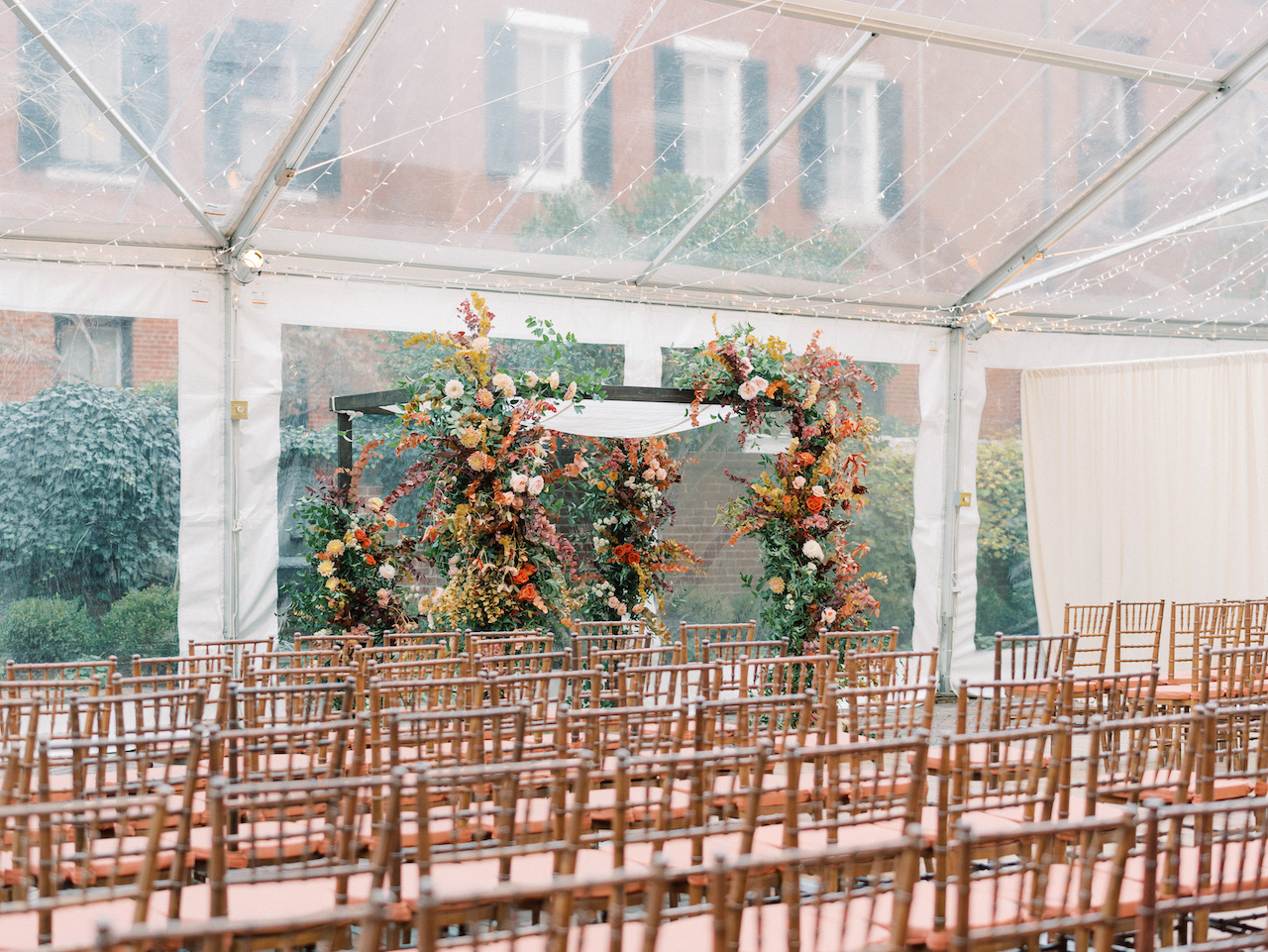 Chuppah with fall foliage at Decatur House wedding